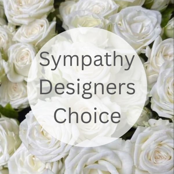 White roses with a "Sympathy Designers Choice" label
