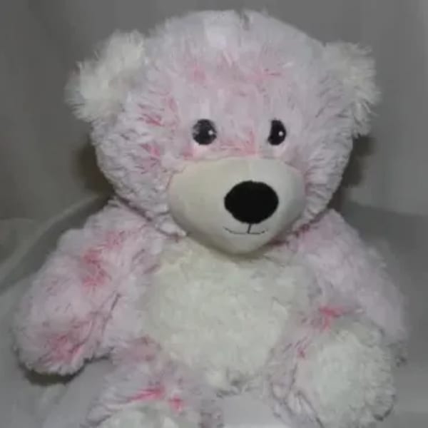 Pink and white teddy bear plush toy
