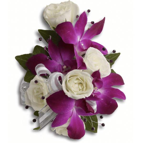 Purple orchids and white roses with ribbon accents