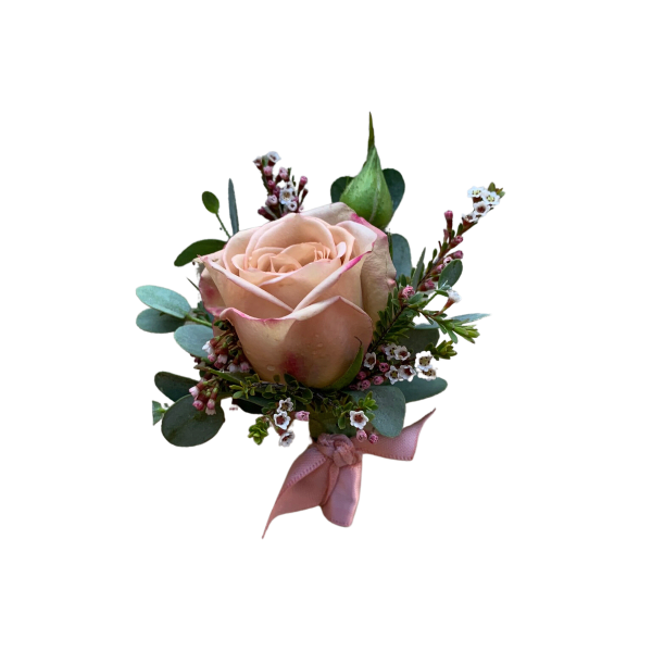 Single blush rose with small pink-white filler flowers and a pink ribbon