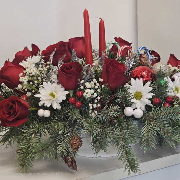 Beautiful Christmas arrangement with candelas