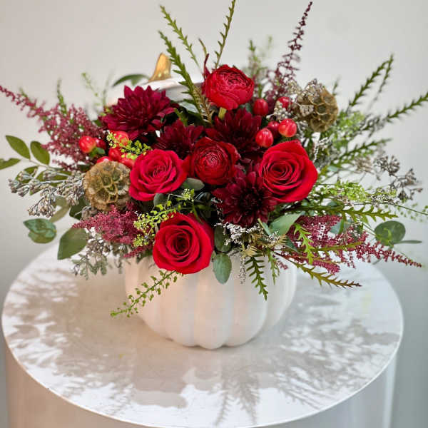 Ceramic Pumpkin with fall flowers/ red flowers ™