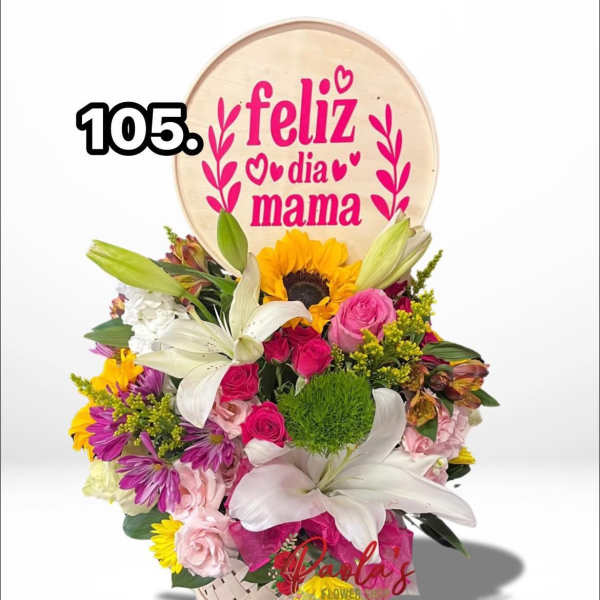 Mixed flower basket with a "feliz dia mama" sign