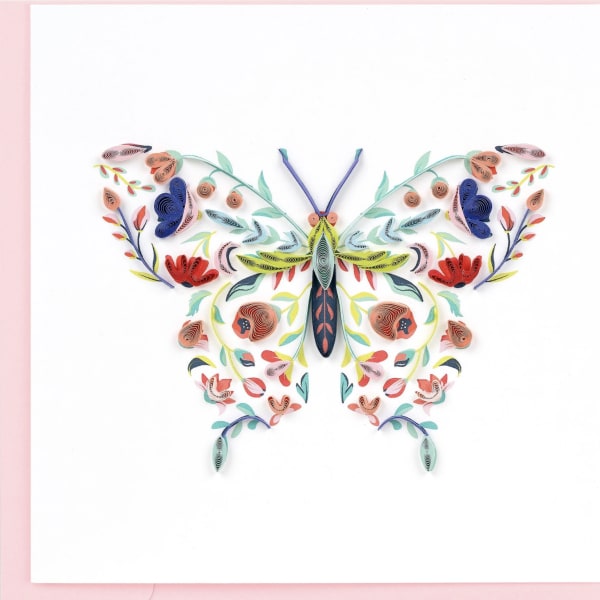 Colorful paper butterfly artwork on a white background