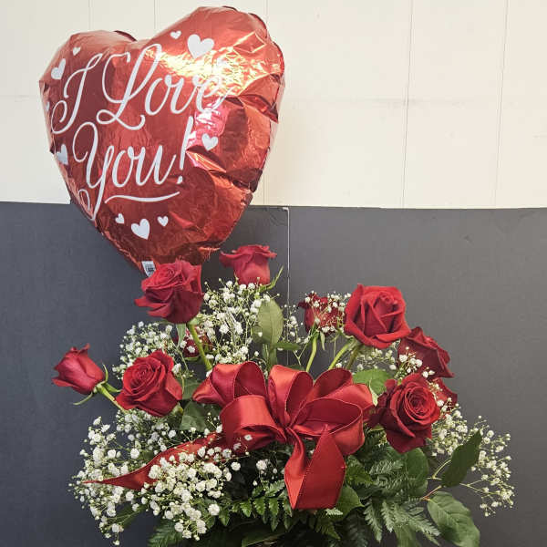 Red rose bouquet with a heart balloon, chocolates, and a candle