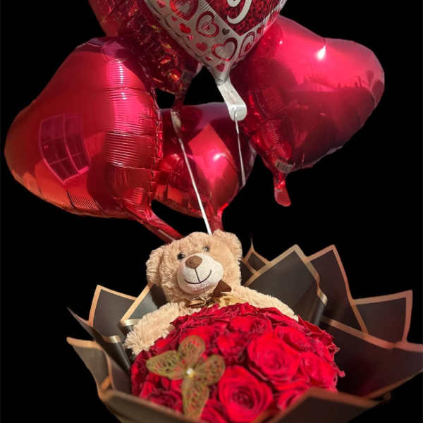 Red rose bouquet with a teddy bear and heart balloons