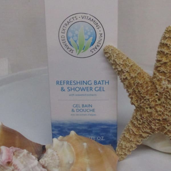 Bottle of Inis refreshing bath and shower gel with seashells