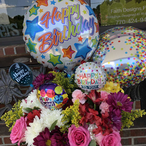 Birthday balloon bouquet with mixed flowers in a white box