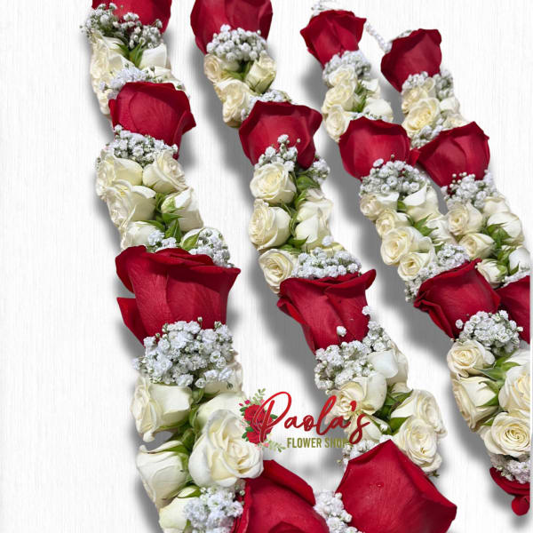 Red and white rose garlands with baby's breath on a white background