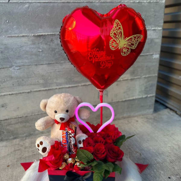 detalles con globos y peluche