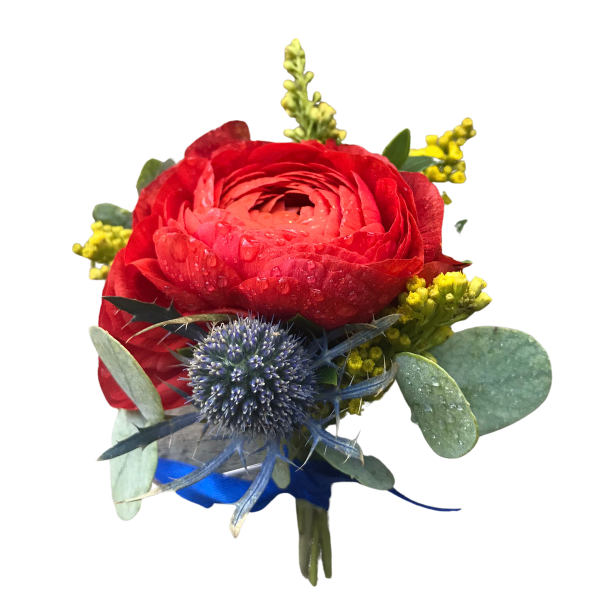 Red ranunculus bouquet with blue thistle and yellow filler flowers