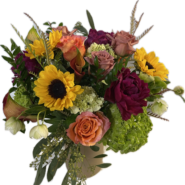 Mixed bouquet with sunflowers, roses, and hydrangeas in a vase