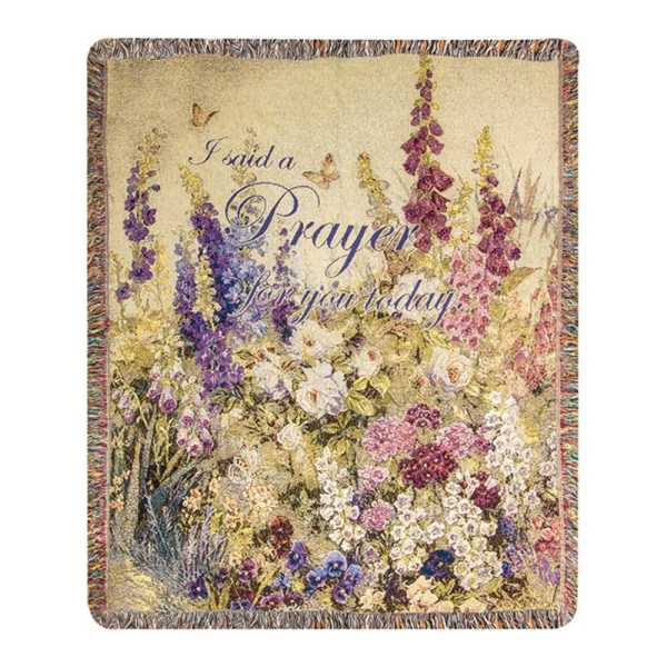 Floral prayer blanket with purple text and a multicolor flower garden design