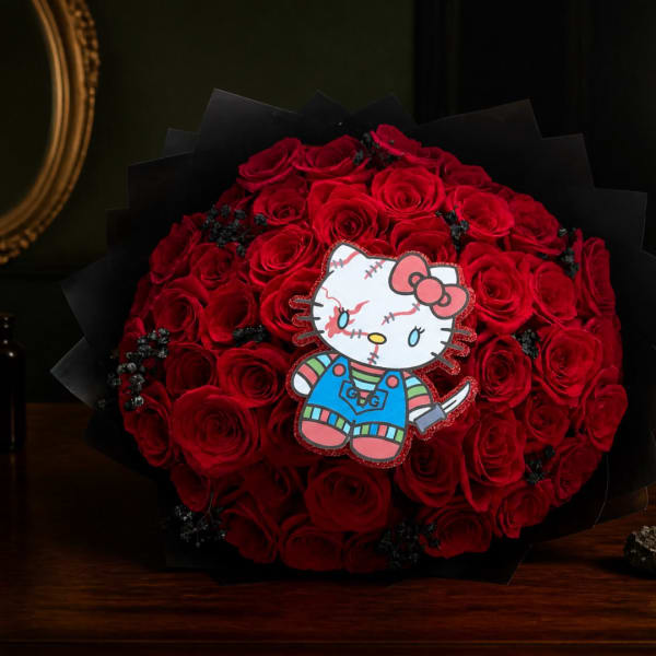 Bouquet of red roses with a Hello Kitty topper