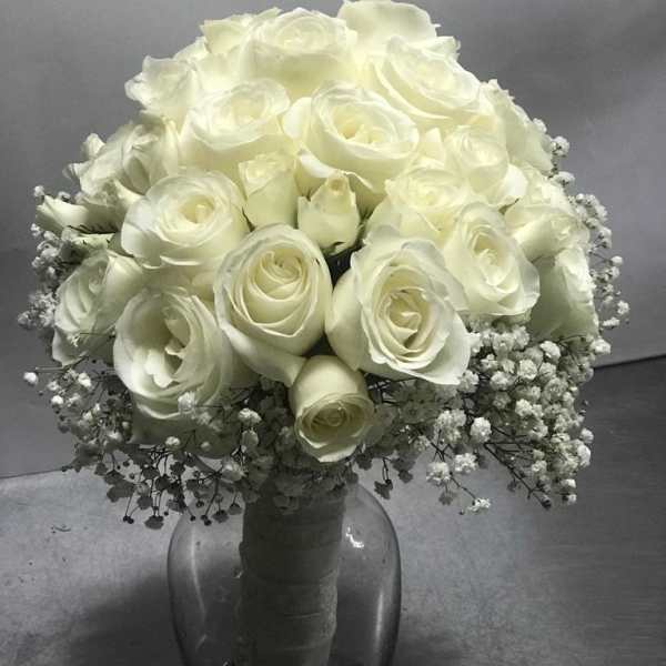 White rose bouquet in a glass vase