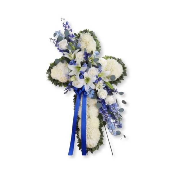 White and blue floral cross with ribbon on a stand