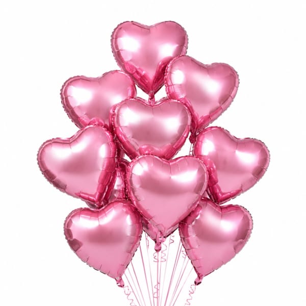 Cluster of pink heart-shaped balloons on strings
