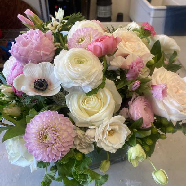 Bouquet of pink and white flowers with roses and dahlias