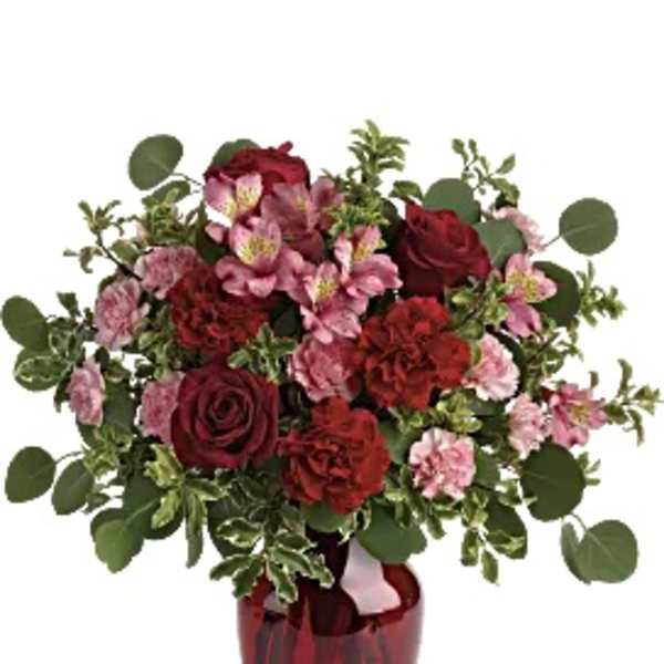 Red and pink bouquet in a red vase