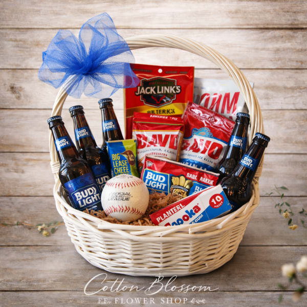 Gift basket with beer bottles, snacks, and a baseball