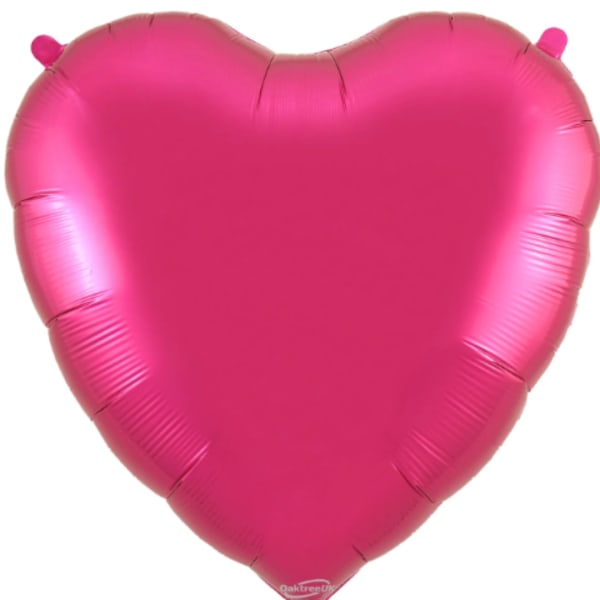 Pink heart-shaped balloon on a white background