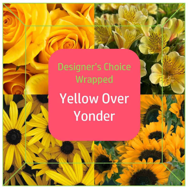 Yellow roses, alstroemeria, and sunflowers arranged around a label