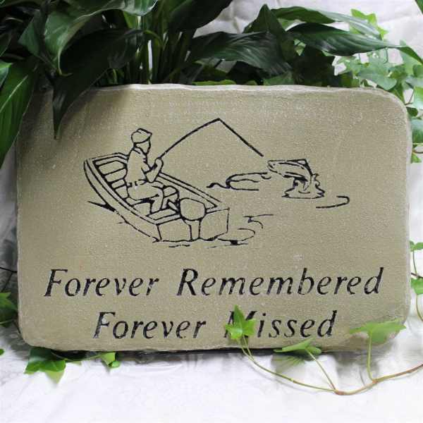 Memorial stone with a fishing scene and the words Forever Remembered Forever Missed