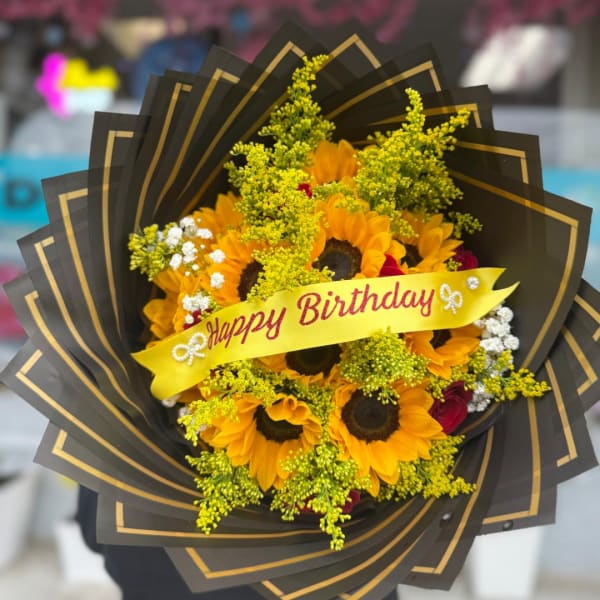 Sunflower bouquet with a Happy Birthday ribbon