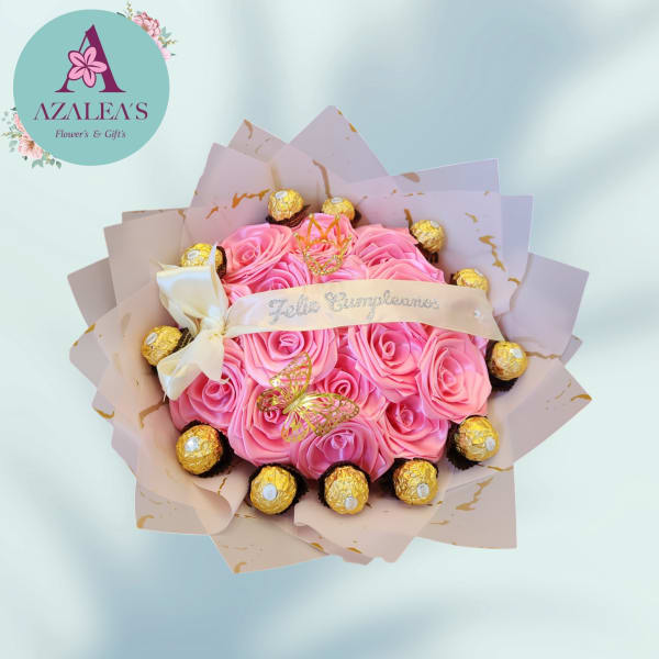 Pink rose bouquet with Ferrero Rocher chocolates and a cream ribbon