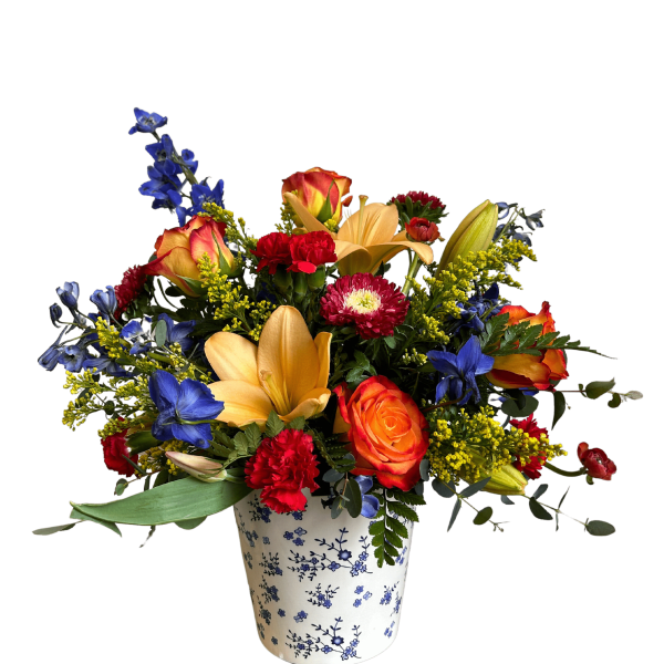 Mixed bouquet in a blue-and-white ceramic vase