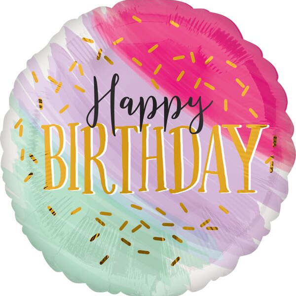 Round birthday balloon with pastel rainbow frosting design