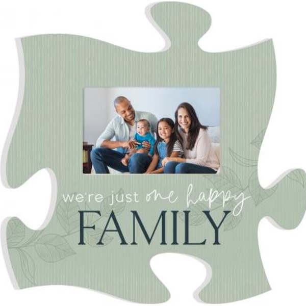 Puzzle-piece photo frame with a family picture and the words "we're just one happy FAMILY"