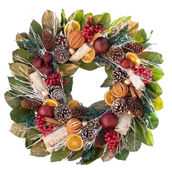 Decorative holiday wreath with pinecones, dried orange slices, berries, and leaves