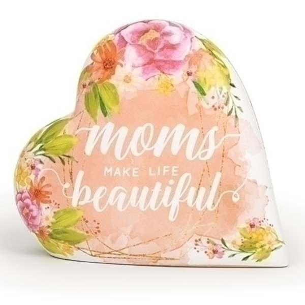 Heart-shaped floral sign with the words "moms make life beautiful"