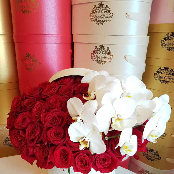 Orchid Round Box by D'Lily's Flowers