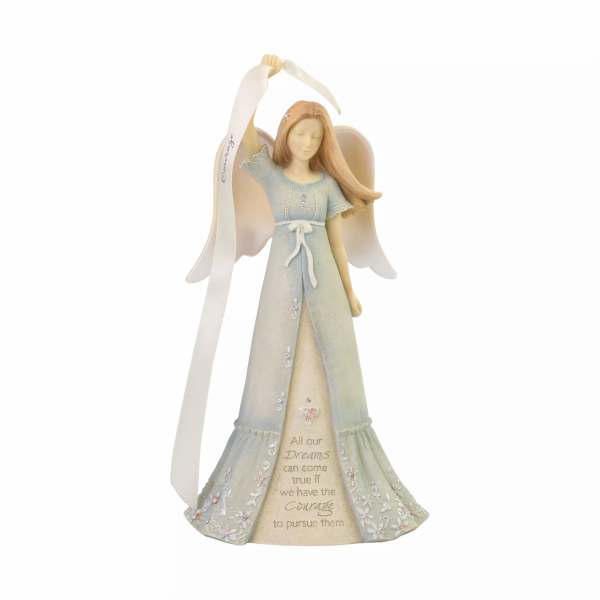 Angel figurine in a pale dress holding a ribbon