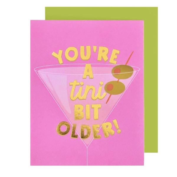 Pink birthday card with a martini glass and gold text