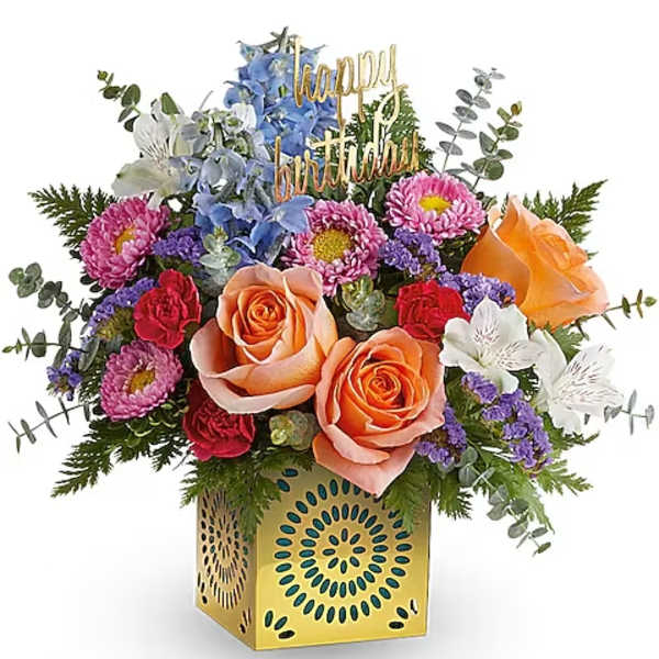 Mixed bouquet with roses, daisies, and a birthday topper in a decorative box