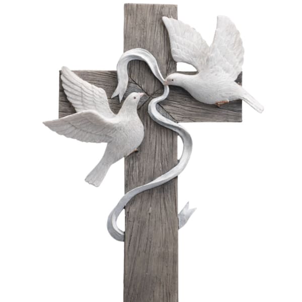 Wooden cross with two white doves and a silver ribbon