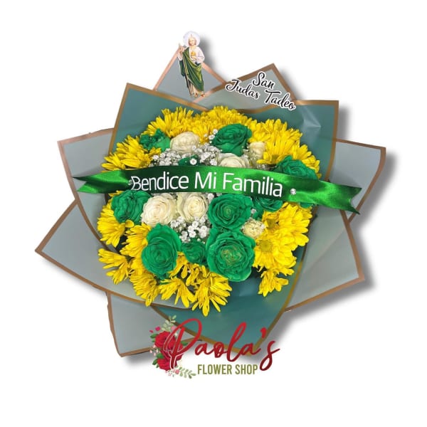 Yellow and green floral bouquet with a saint topper and ribbon