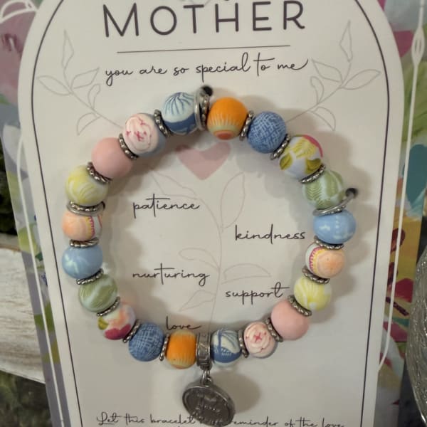 Beaded bracelet displayed on a Mother-themed card with printed words.