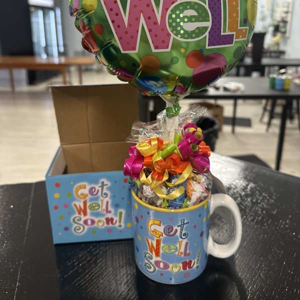 Get well balloon gift in a mug with candy and a card