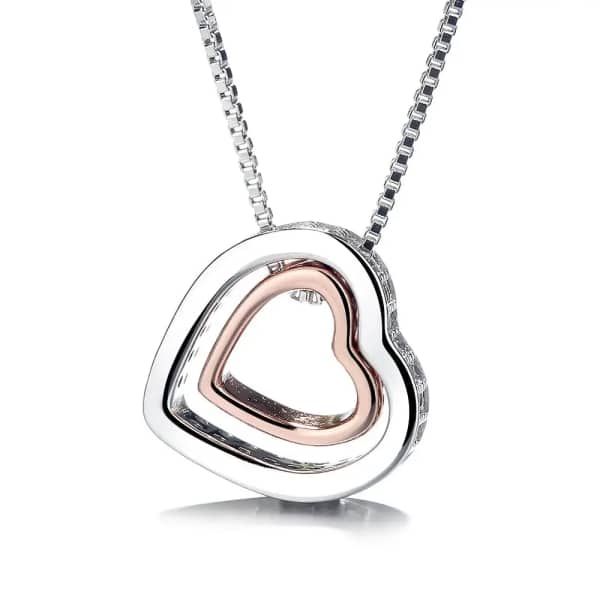 Heart-shaped silver pendant necklace with a rose gold inner heart