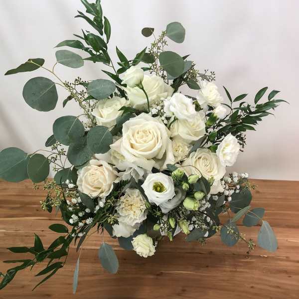 White rose bouquet with eucalyptus and small white filler flowers