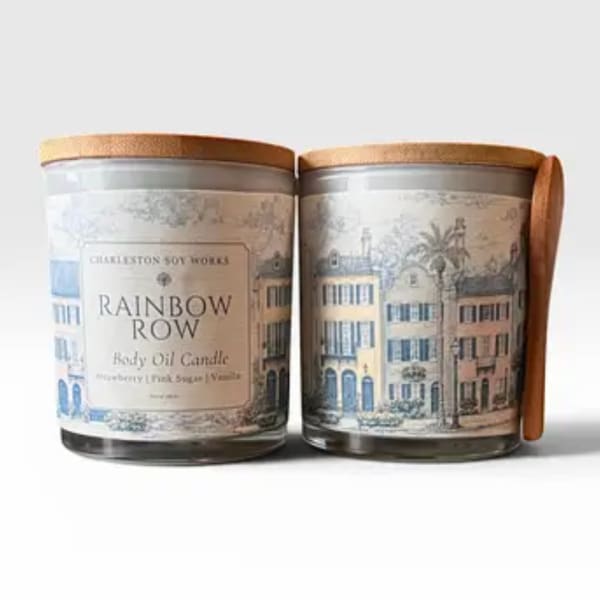 Two labeled glass candles with wooden lids and a ribbon handle