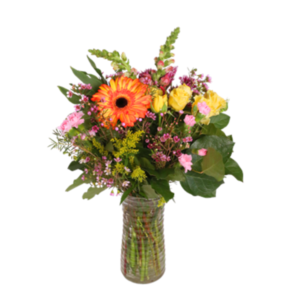 Mixed bouquet of orange, yellow, and pink flowers in a glass vase