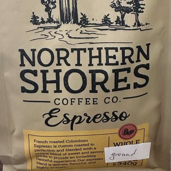 Bag of Northern Shores Coffee Co. espresso with a Columbia origin label