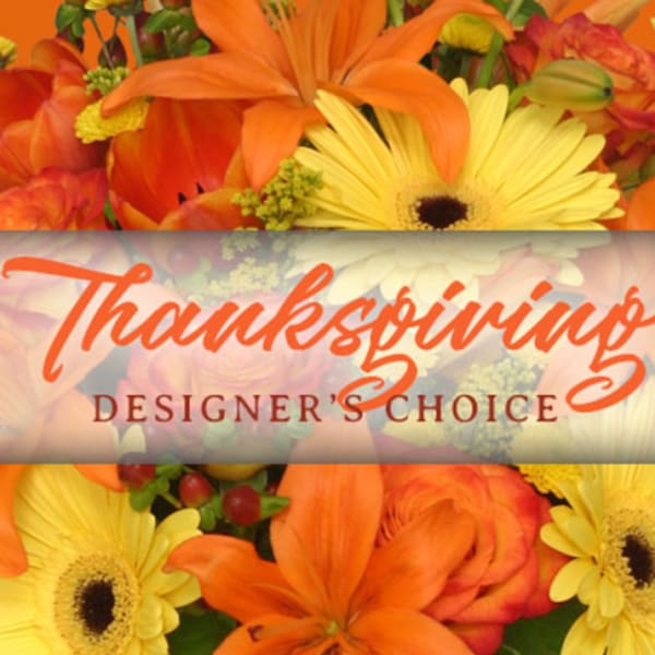 Thanksgiving designer's choice floral arrangement with orange and yellow blooms