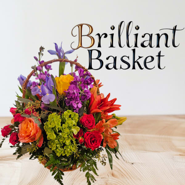 Colorful flower basket with roses, lilies, and purple blooms