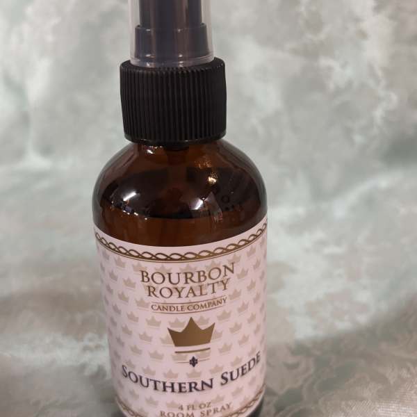 Amber room spray bottle labeled Southern Suede